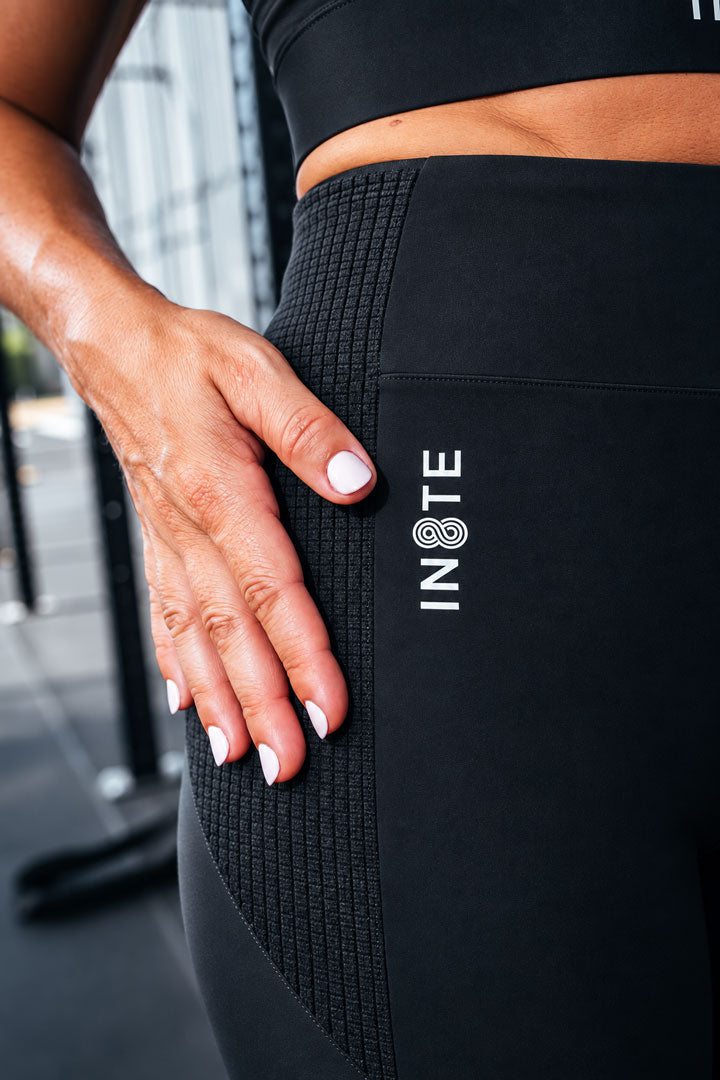 female compression shorts in8te branding