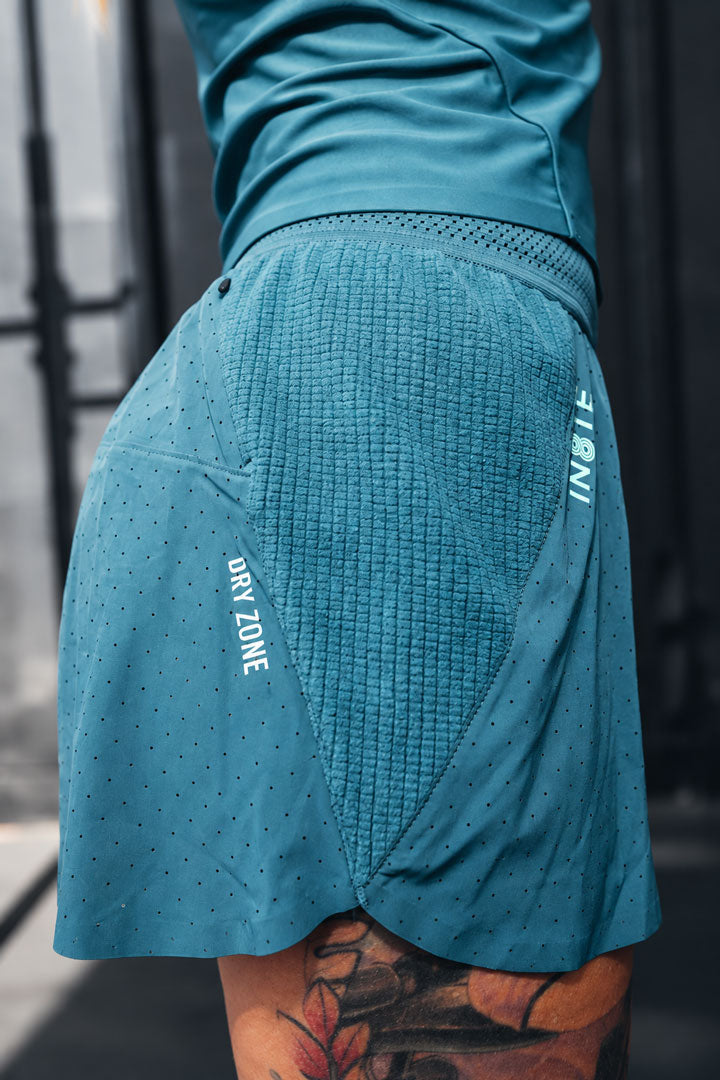 RAISED FRONT HEM — Breaking 50 Short Women Teal