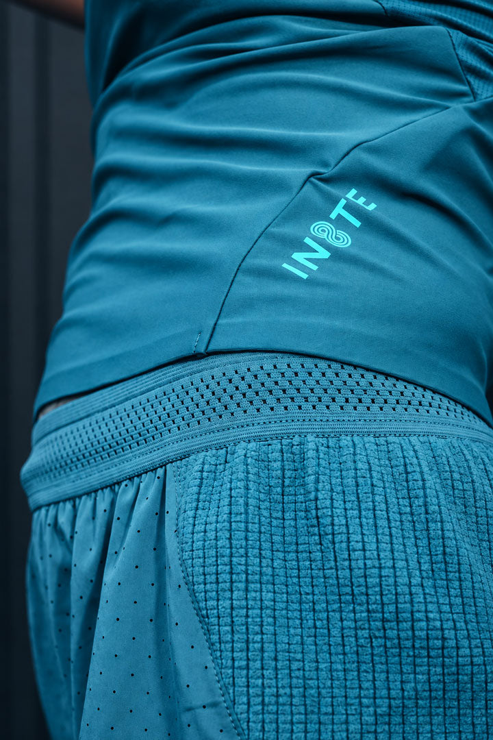 IN8TE BRANDING — The Limit Tank Women Teal