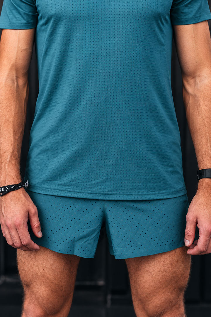 men race shorts teal inner slip