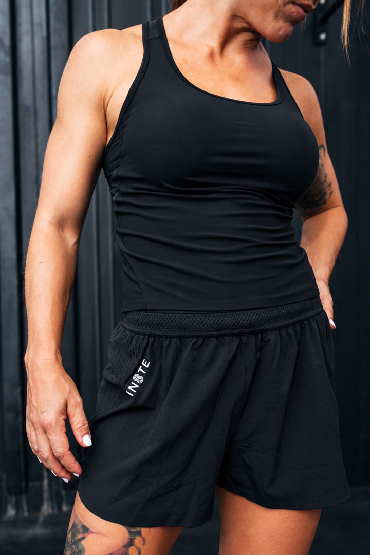 women woven shorts black raised front hem